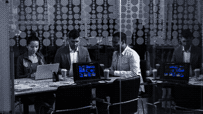 Pixel-art scene of professionals at work