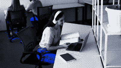 Pixel-art scene of a team collaborating